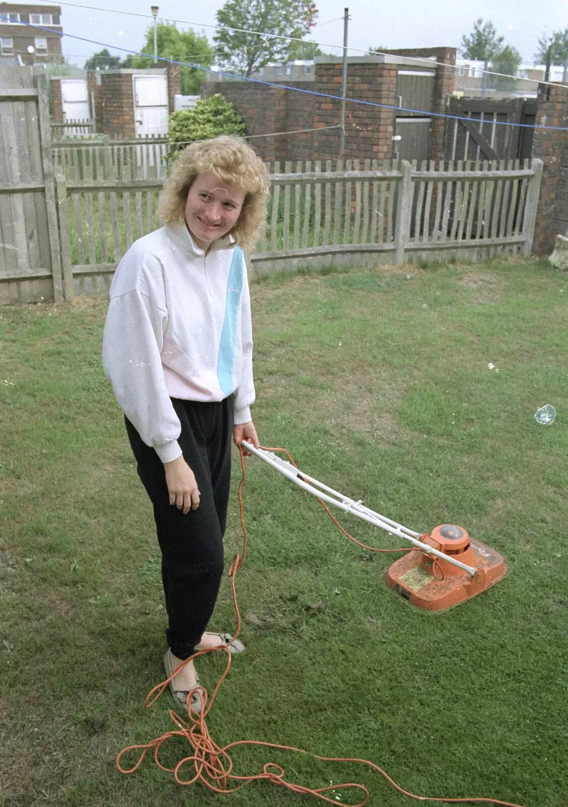 Maria does a spot of mowing with the Flymo, from A Trip to Sean's, and a Battle of Britain Flypast, Farnborough, Suffolk and London - 15th September 1990