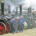 Blokes in boiler suits chat next to engines, The Henham Steam Fair, Henham, Suffolk - 19th September 1990