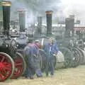 Blokes in boiler suits chat next to engines, The Henham Steam Fair, Henham, Suffolk - 19th September 1990