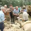 There's some activity over sacks of wheat, The Henham Steam Fair, Henham, Suffolk - 19th September 1990