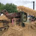 A conveyor belt takes wheat up to the thresher, The Henham Steam Fair, Henham, Suffolk - 19th September 1990