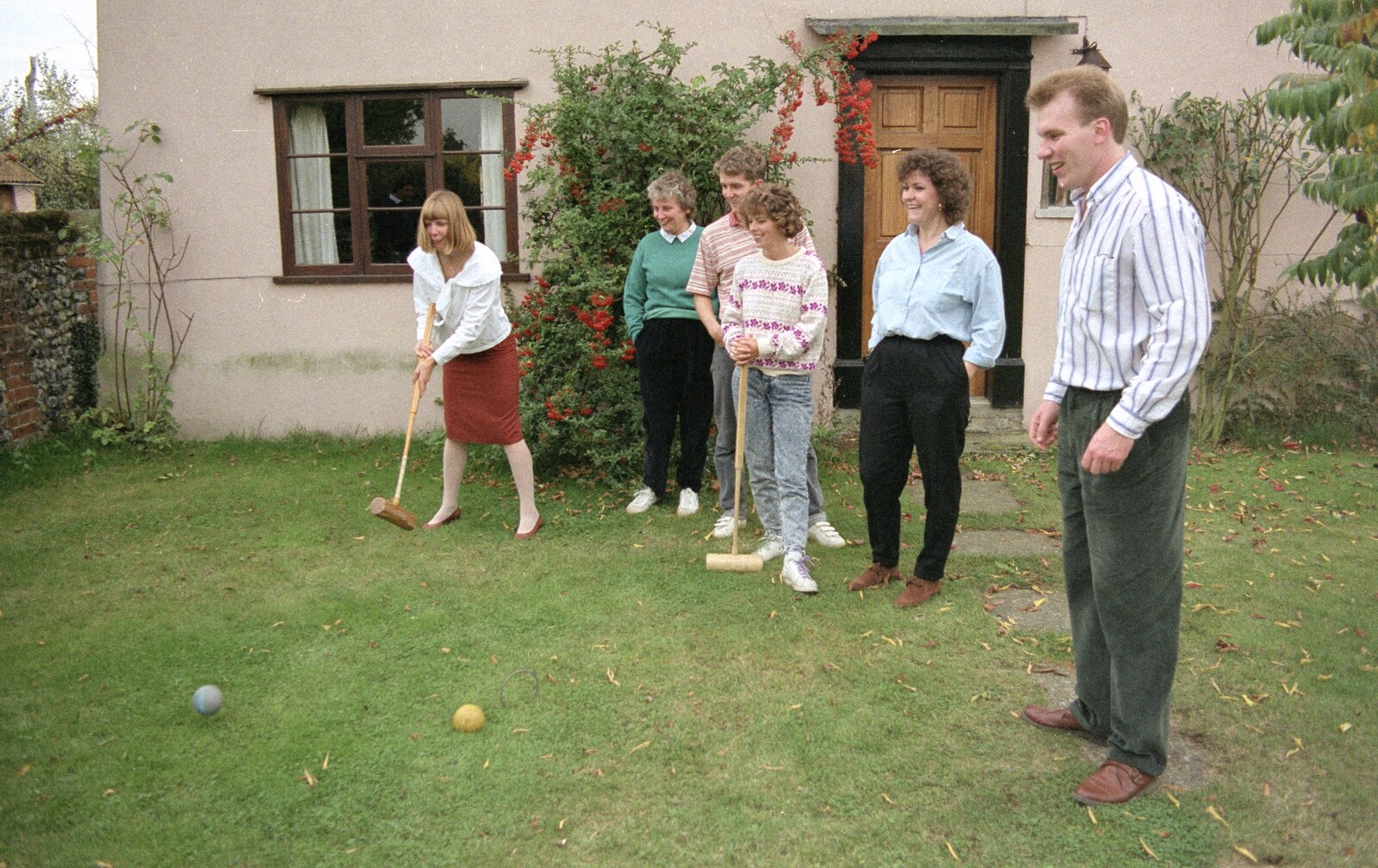 Janet punts along her croquet ball from Croquet, and Printec at the Railway Tavern, Stuston and Diss - 30th September 1990