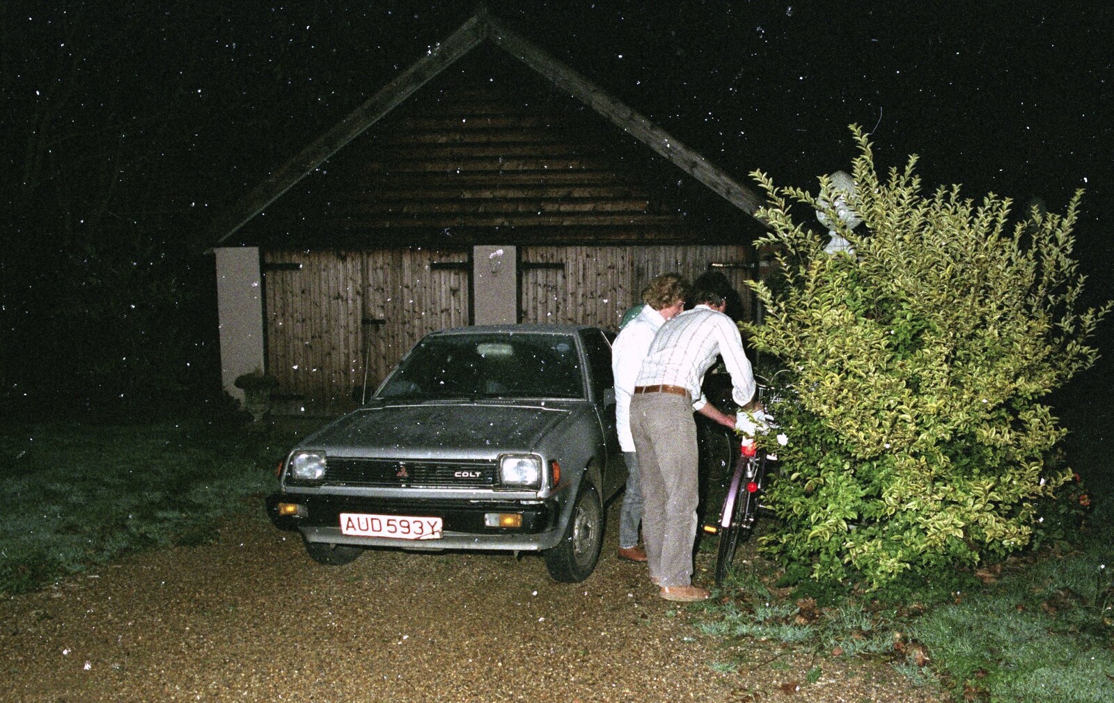 Someone rescues their bike from a hedge from The Old Redgrave Petrol Station, and some Hand Bells, Suffolk and Long Stratton - 8th October 1990