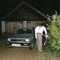 Someone rescues their bike from a hedge, The Old Redgrave Petrol Station, and some Hand Bells, Suffolk and Long Stratton - 8th October 1990