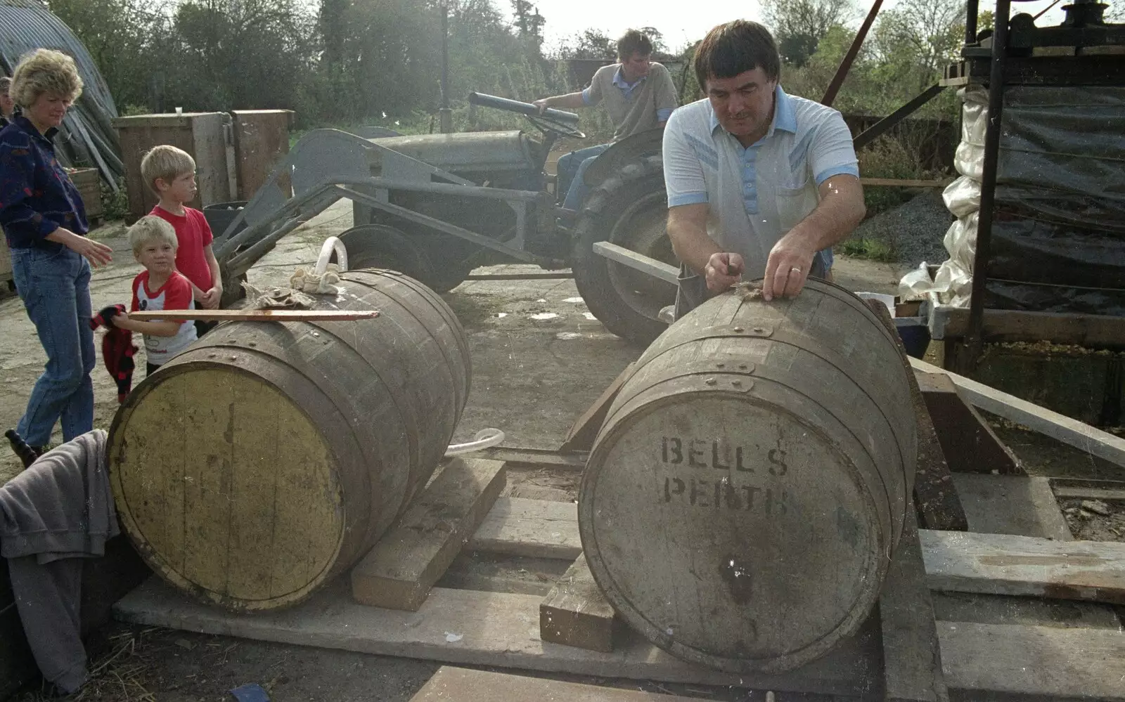 Corky prepares a couple of barrels, from The Annual Cider Making Event, Stuston, Suffolk - 11th October 1990