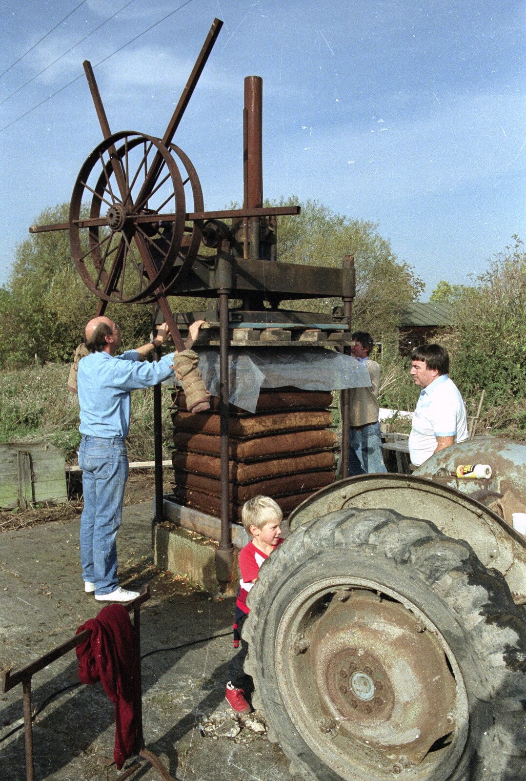 Plastic is put on the top of the cheeses from The Annual Cider Making Event, Stuston, Suffolk - 11th October 1990