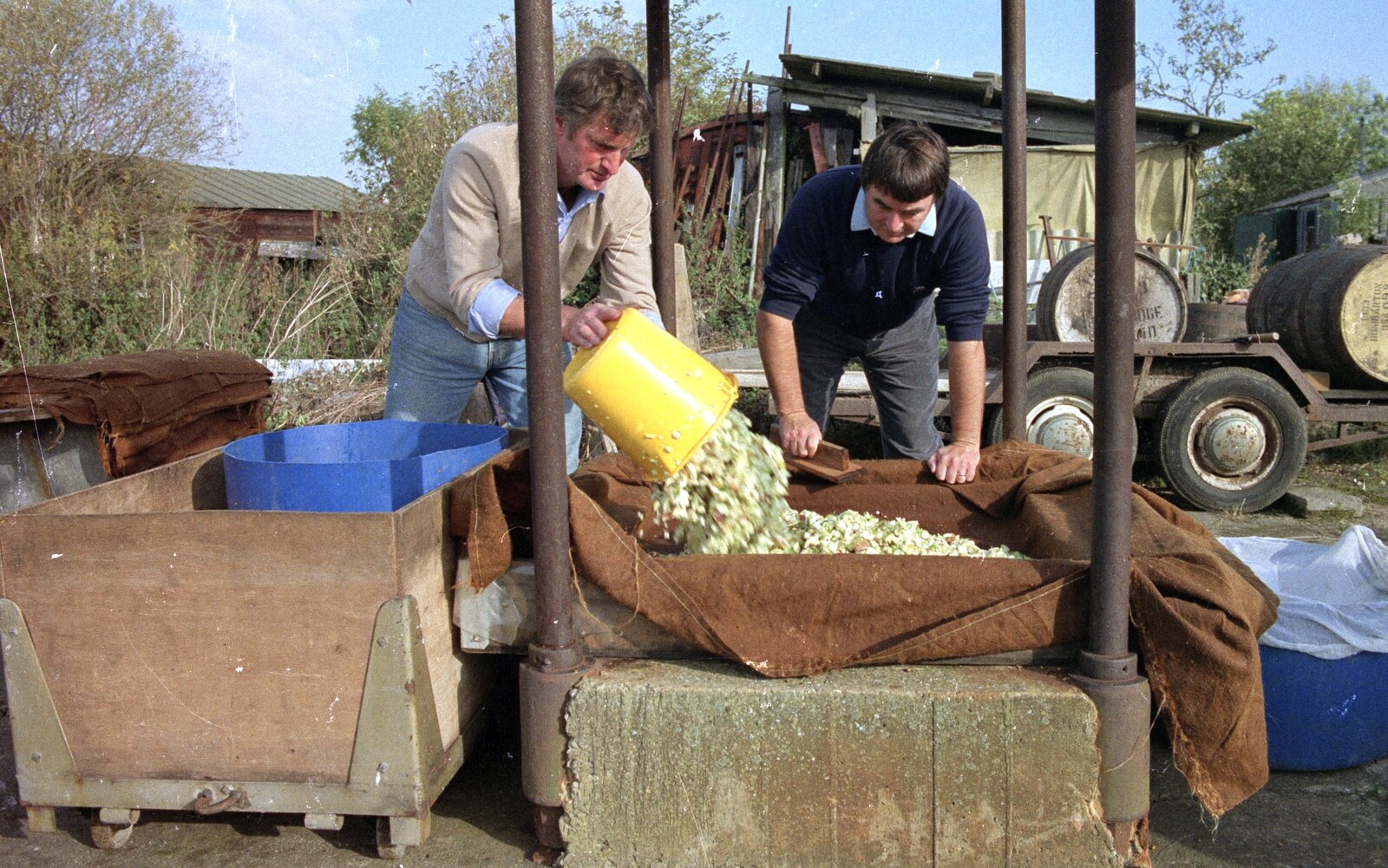 Geoff and Corky lay down the first cheese from The Annual Cider Making Event, Stuston, Suffolk - 11th October 1990