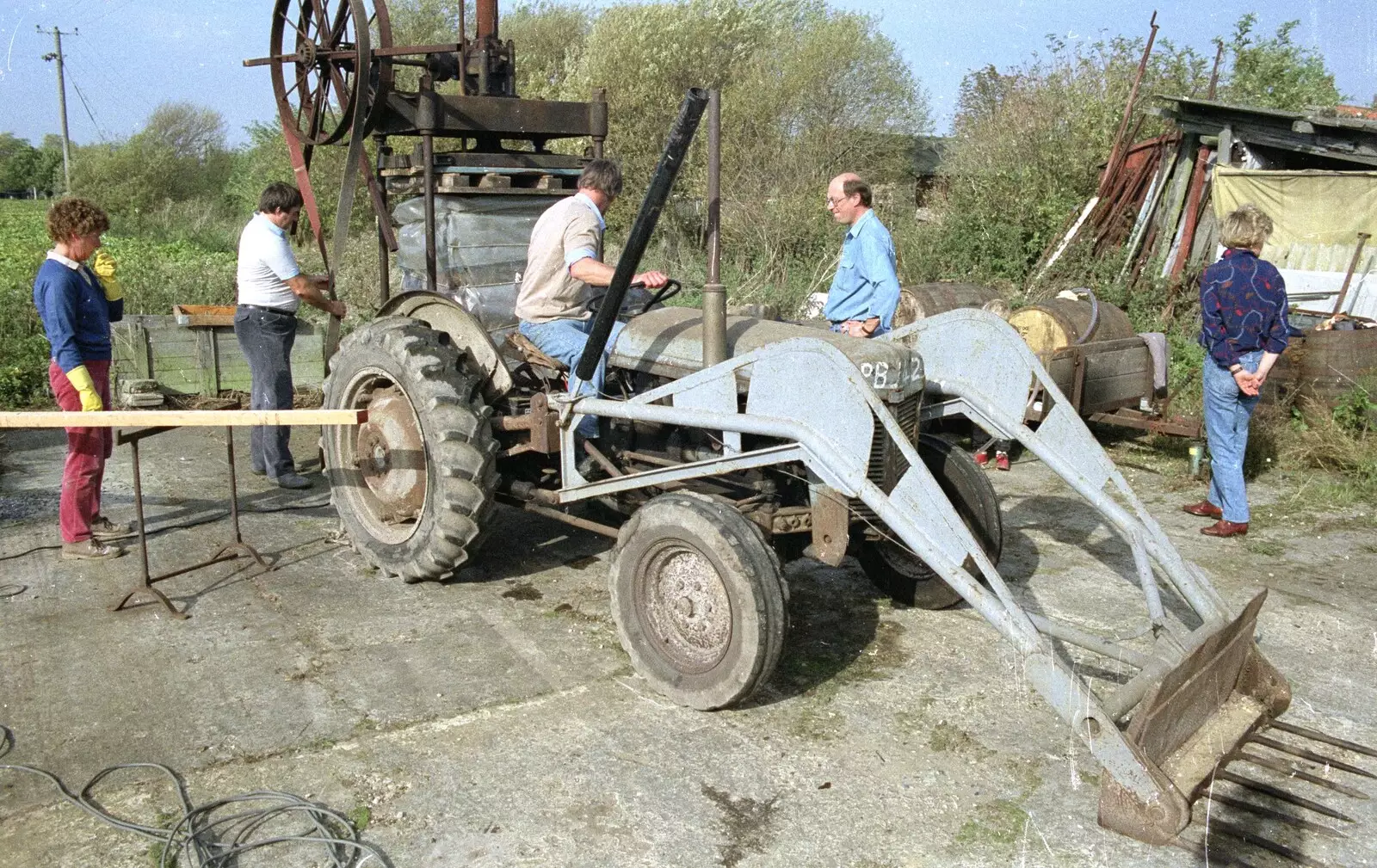 Corky checks the belts, from The Annual Cider Making Event, Stuston, Suffolk - 11th October 1990