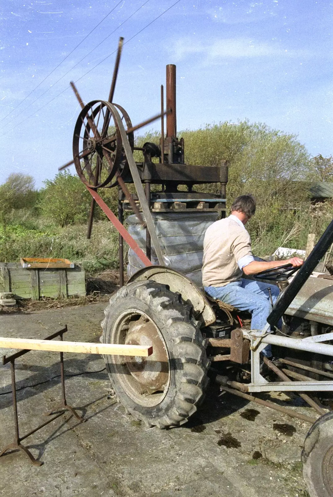 Geoff spins up the press, from The Annual Cider Making Event, Stuston, Suffolk - 11th October 1990