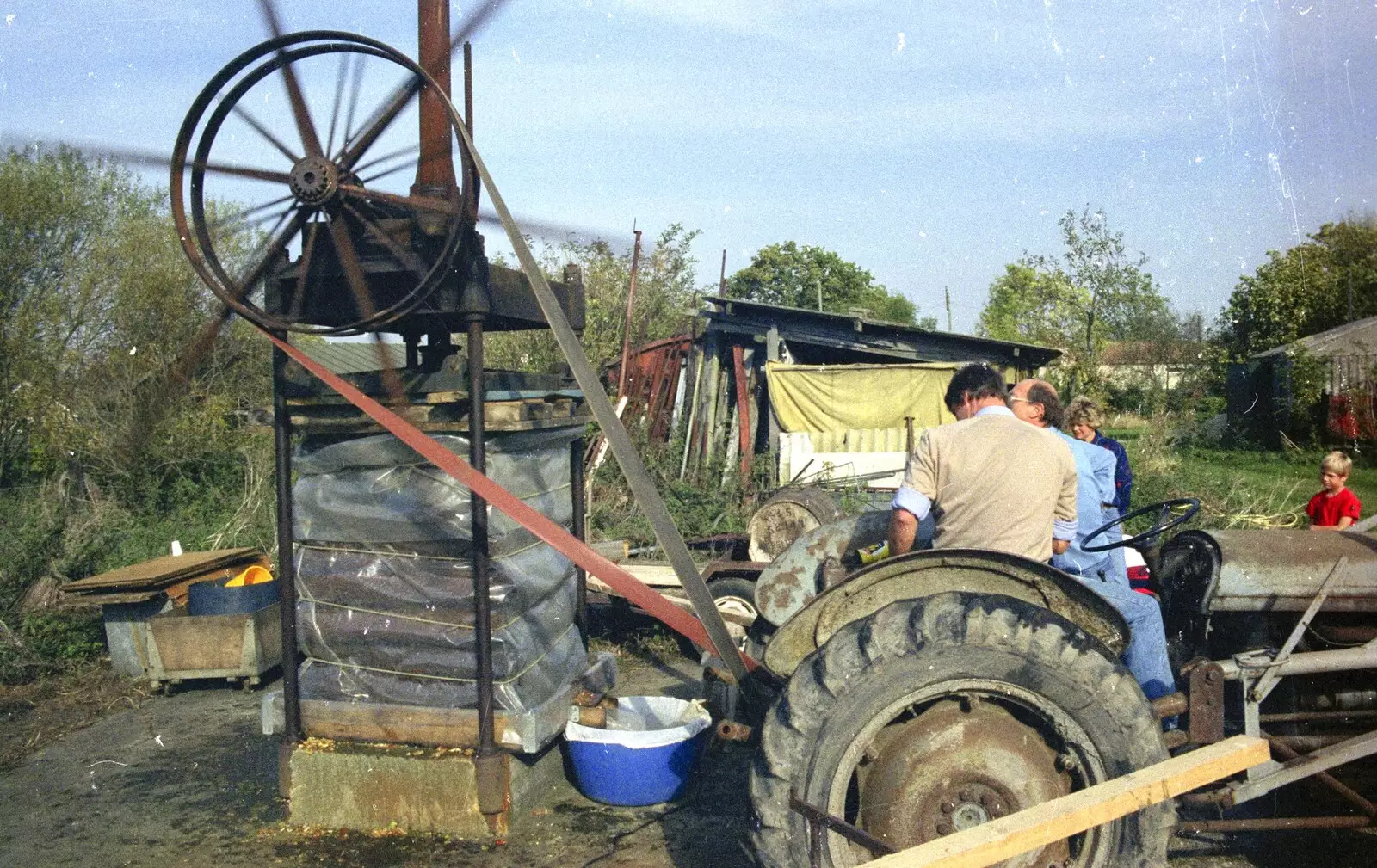 Geoff spins up Winnie and drives the press, from The Annual Cider Making Event, Stuston, Suffolk - 11th October 1990