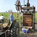 John Chapman inspects the stack of cheeses, The Annual Cider Making Event, Stuston, Suffolk - 11th October 1990