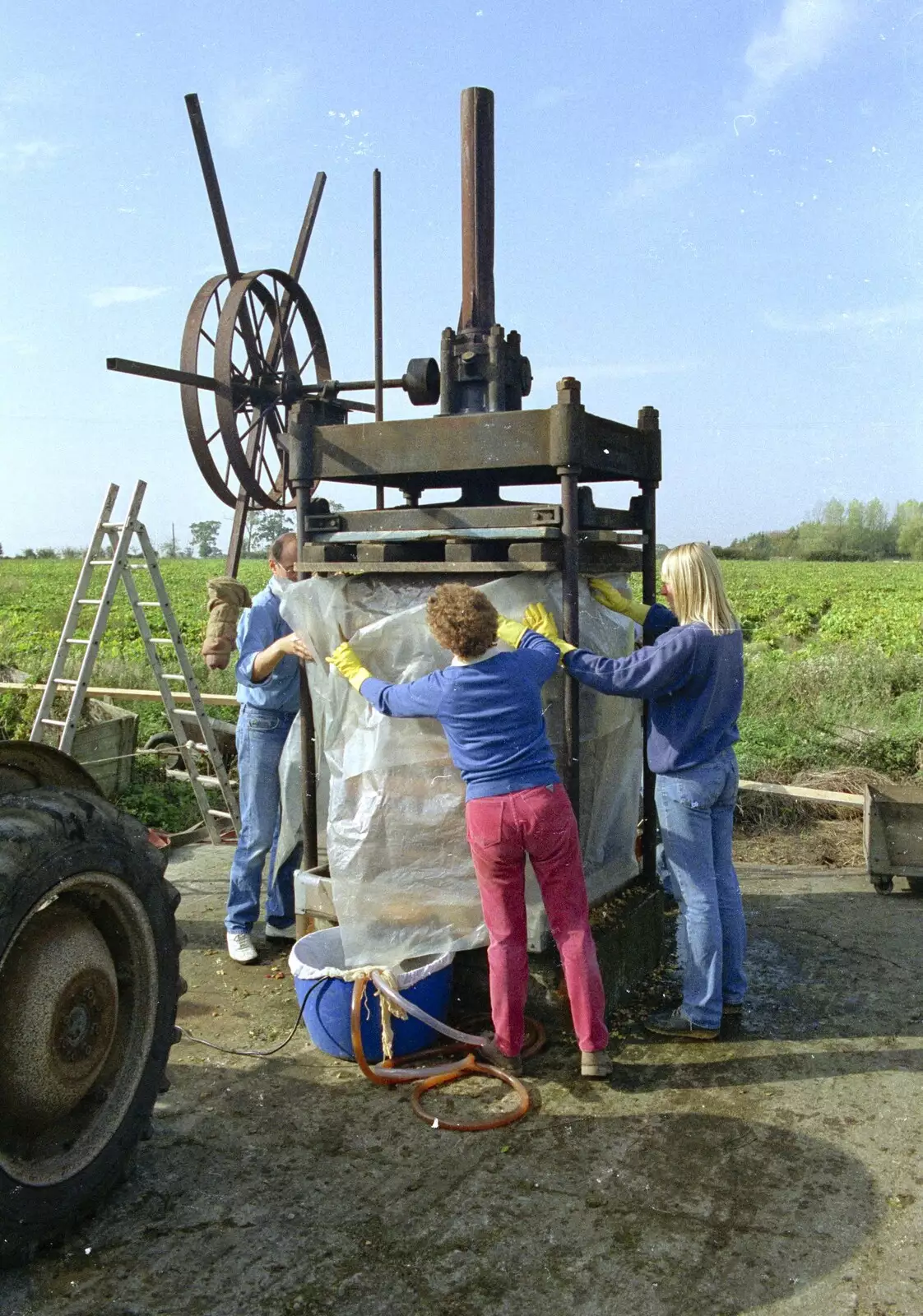 Brenda and Sue wrap up the cheese stack, from The Annual Cider Making Event, Stuston, Suffolk - 11th October 1990