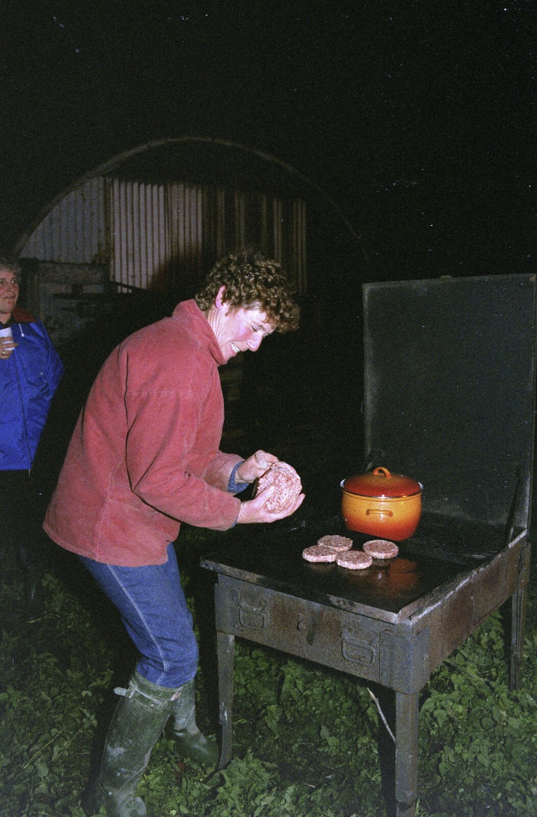 Brenda sticks some burgers on from Bonfire Night, Stuston, Suffolk - 5th November 1990