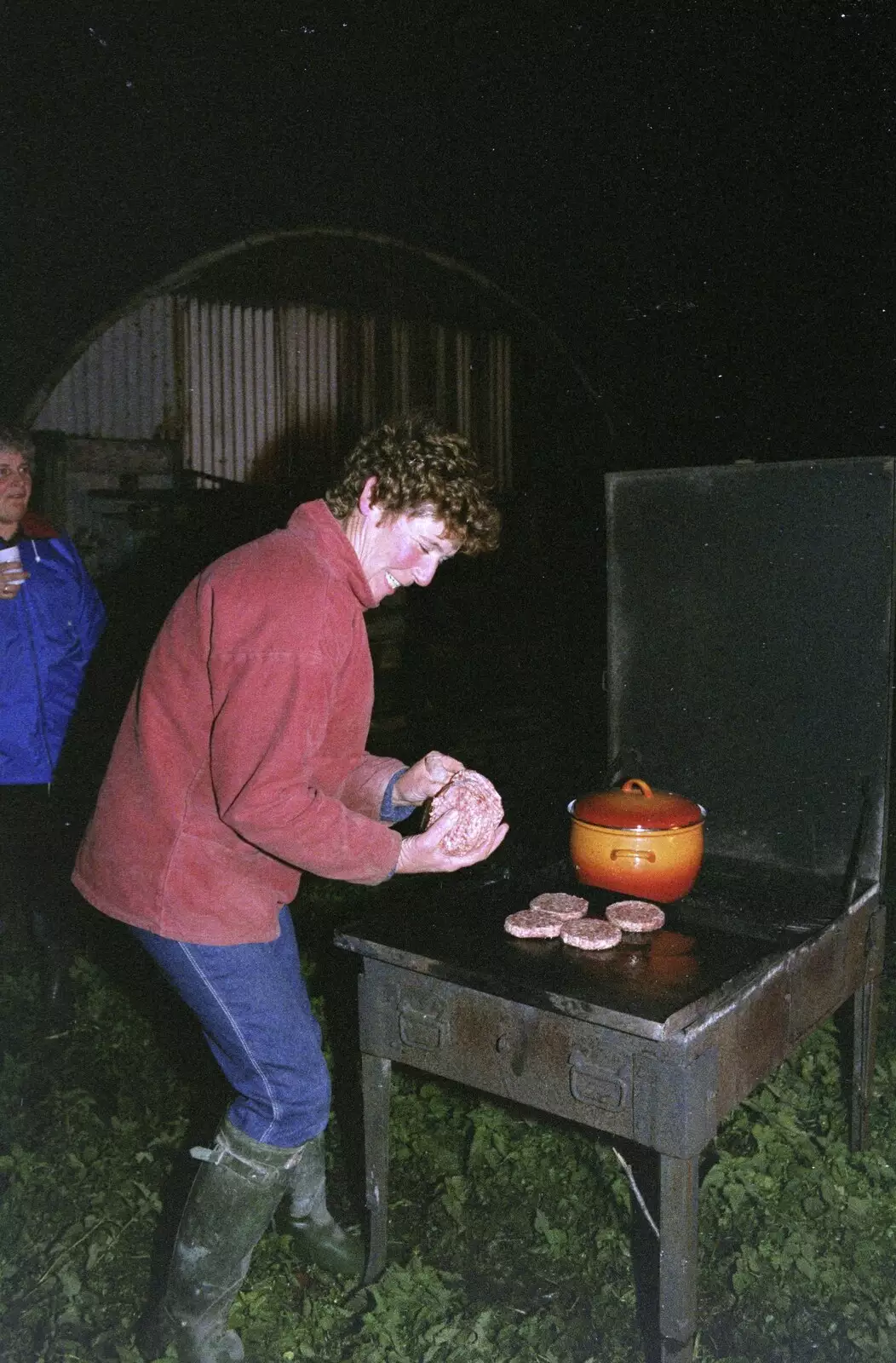 Brenda sticks some burgers on, from Bonfire Night, Stuston, Suffolk - 5th November 1990