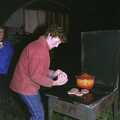Brenda sticks some burgers on, Bonfire Night, Stuston, Suffolk - 5th November 1990