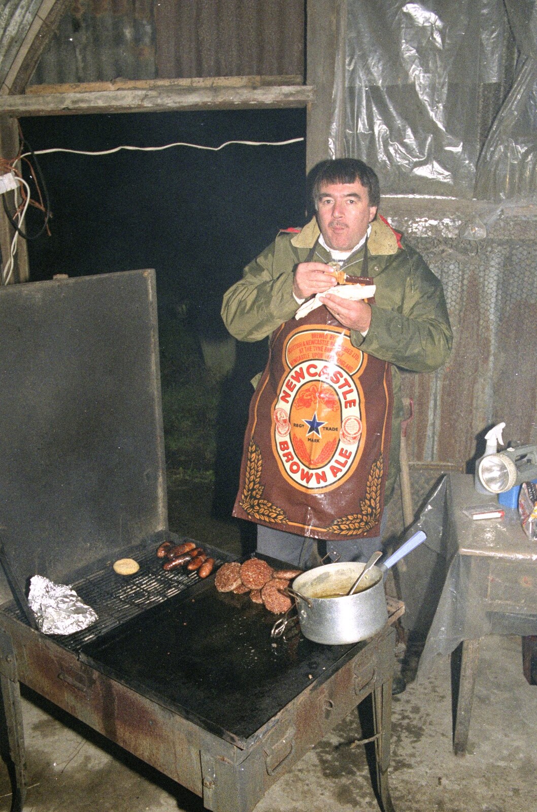 Corky tests his cooking from Bonfire Night, Stuston, Suffolk - 5th November 1990
