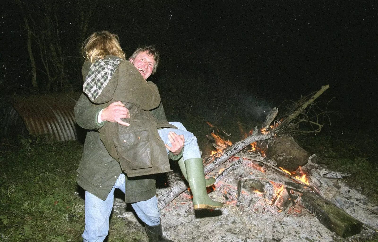 Geoff tries to throw Janet on to the bonfire, from Bonfire Night, Stuston, Suffolk - 5th November 1990