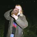Janet has a swig from a demijohn of cider, Bonfire Night, Stuston, Suffolk - 5th November 1990