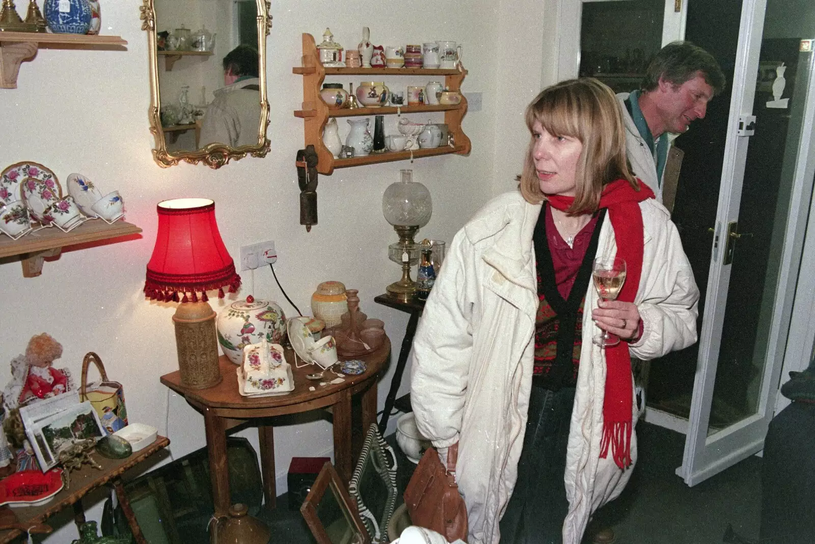 Janet pokes around Victoria Antiques, from Carol Singing and Late Night Shopping, Stuston, Diss and Harleston, Norfolk - 16th December 1990