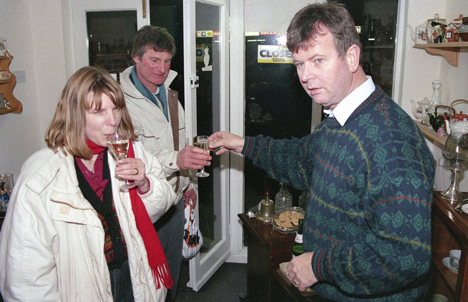 Geoff gets handed a glass of wine from Carol Singing and Late Night Shopping, Stuston, Diss and Harleston, Norfolk - 16th December 1990