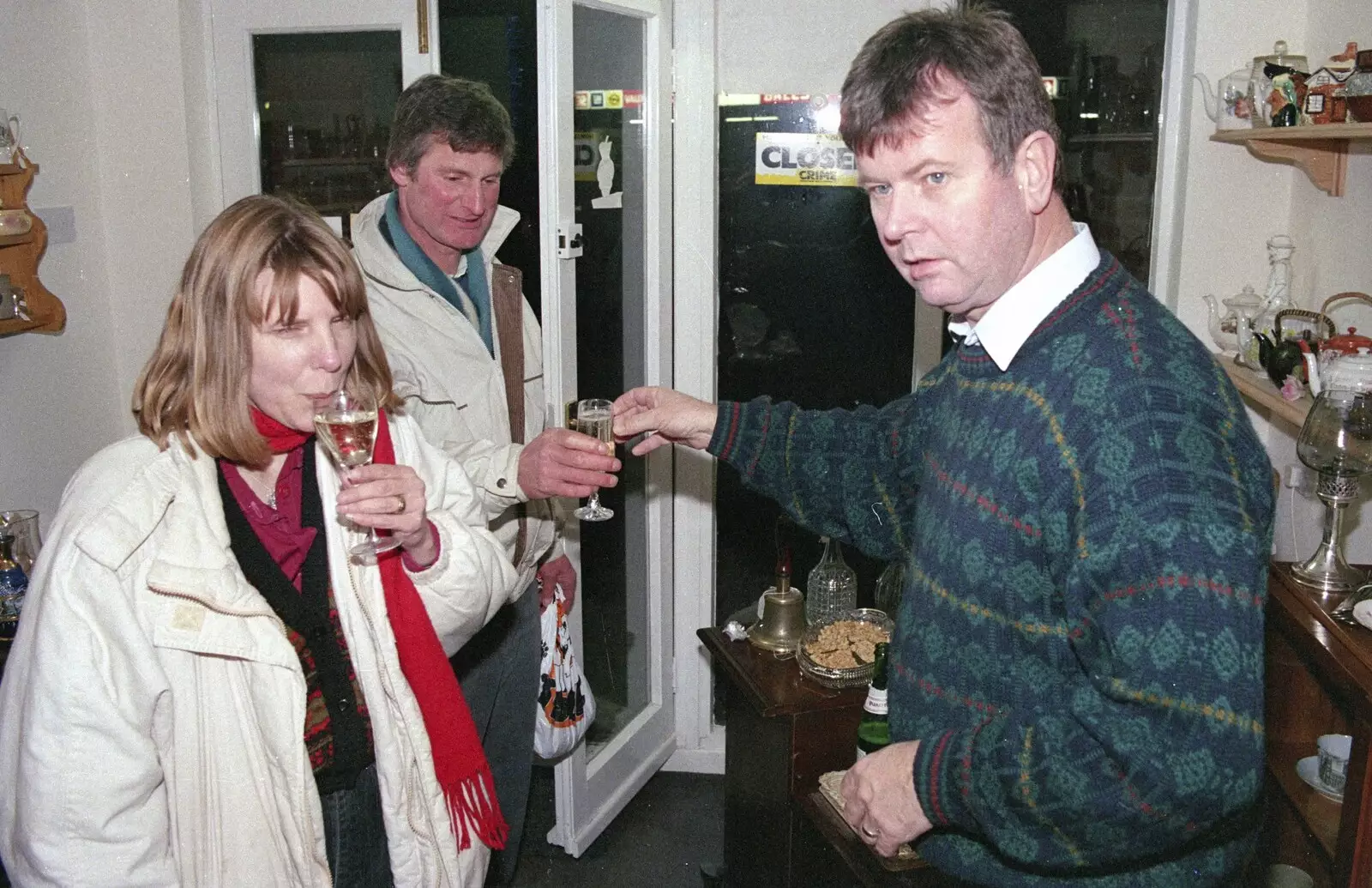 Geoff gets handed a glass of wine, from Carol Singing and Late Night Shopping, Stuston, Diss and Harleston, Norfolk - 16th December 1990