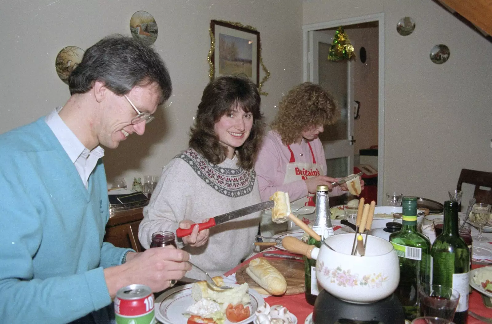 Angela spears a chunk of bread as we eat fondue, from Totnes Pre-Christmas, Devon - 19th December 1990