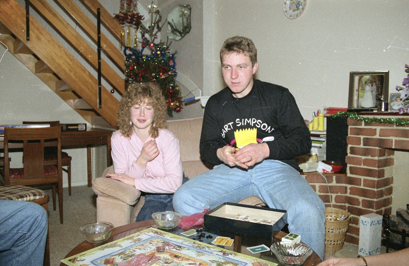 Pamela, Gary and a Bart Simpson tee-shirt from Totnes Pre-Christmas, Devon - 19th December 1990