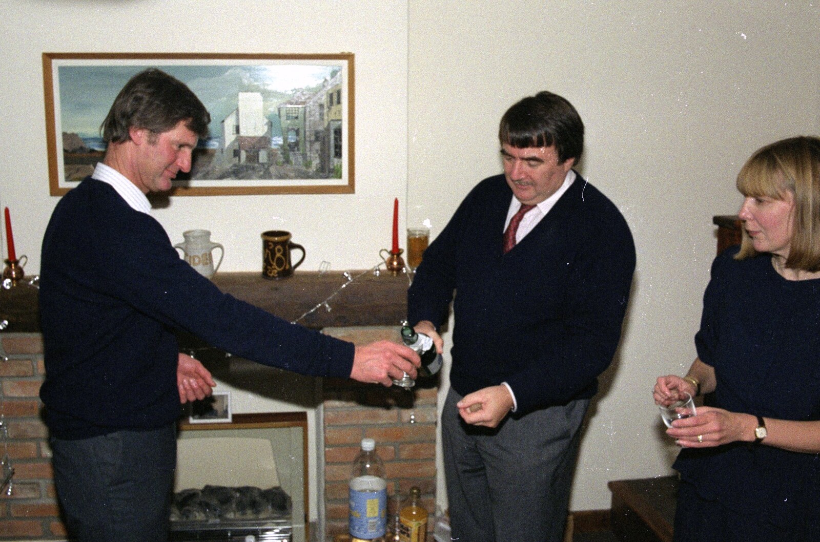 Corky pours the vino from Pre-Christmas Dinner and a Next-Door Do, Stuston, Suffolk - 20th December 1990