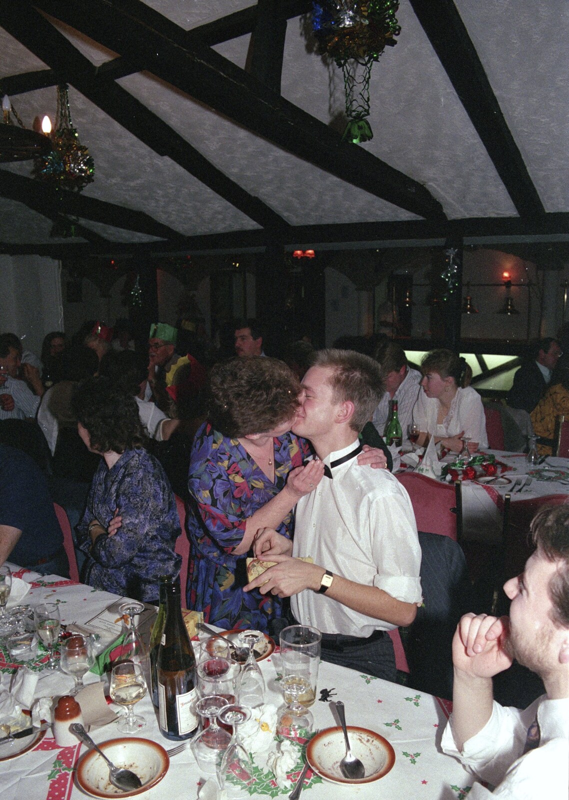 Nosher gets a kiss from Crispy from Printec's Christmas Dinner, Harleston, Norfolk - 22nd December 1990