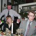 Geoff sticks bottles of wine in Janet's ears, Christmas Dinner with Geoff and Brenda, Stuston, Suffolk - 25th December 1990