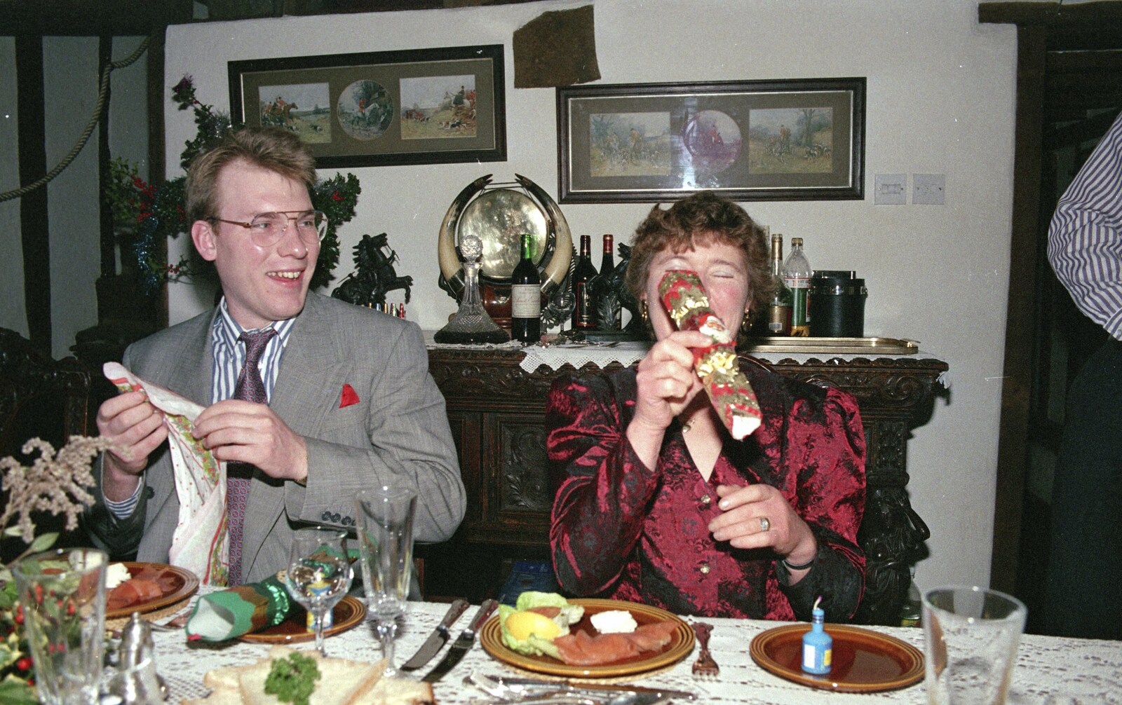 Brenda gets a cracker from Christmas Dinner with Geoff and Brenda, Stuston, Suffolk - 25th December 1990