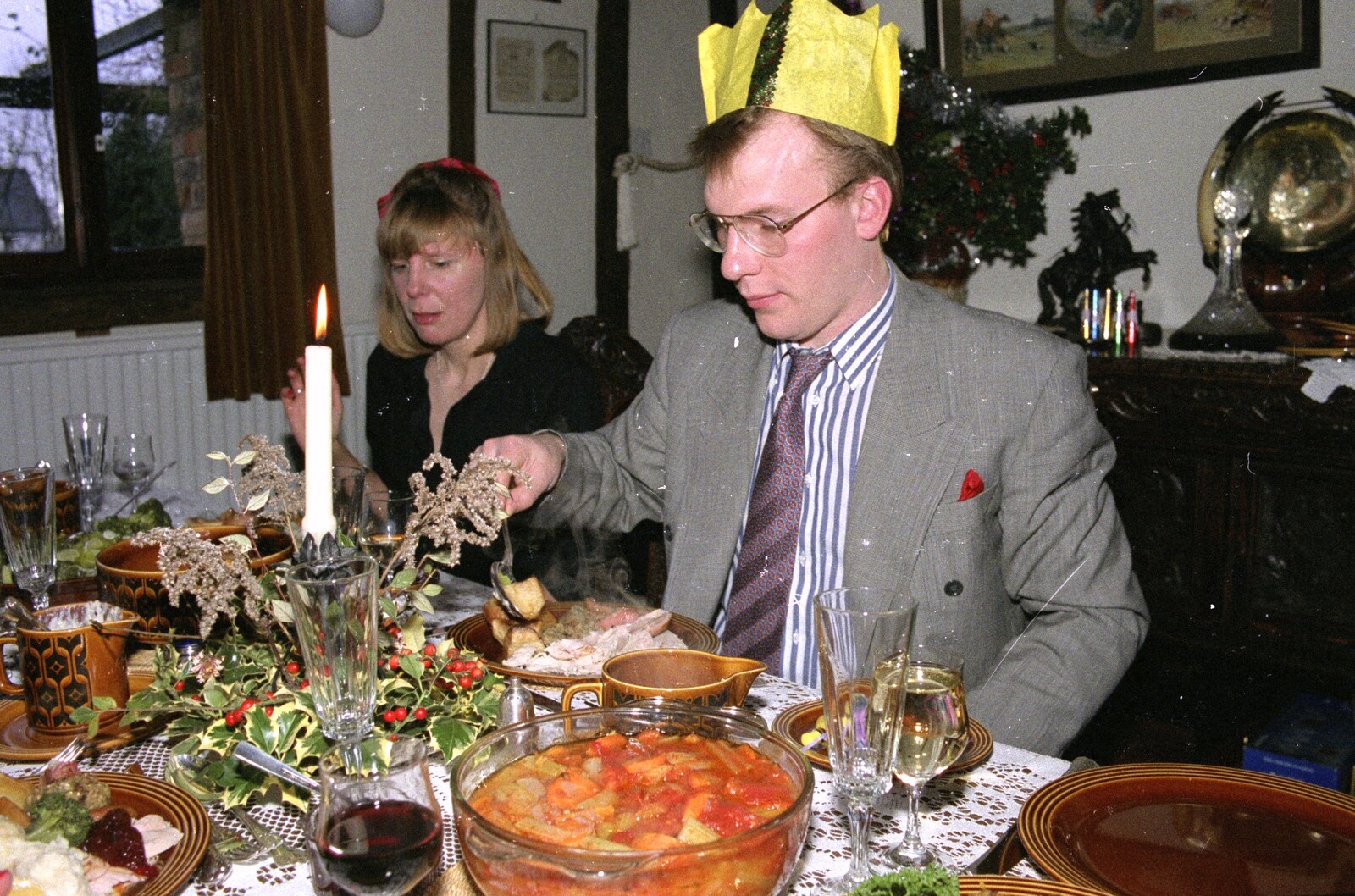 Darren serves up a roast potato from Christmas Dinner with Geoff and Brenda, Stuston, Suffolk - 25th December 1990