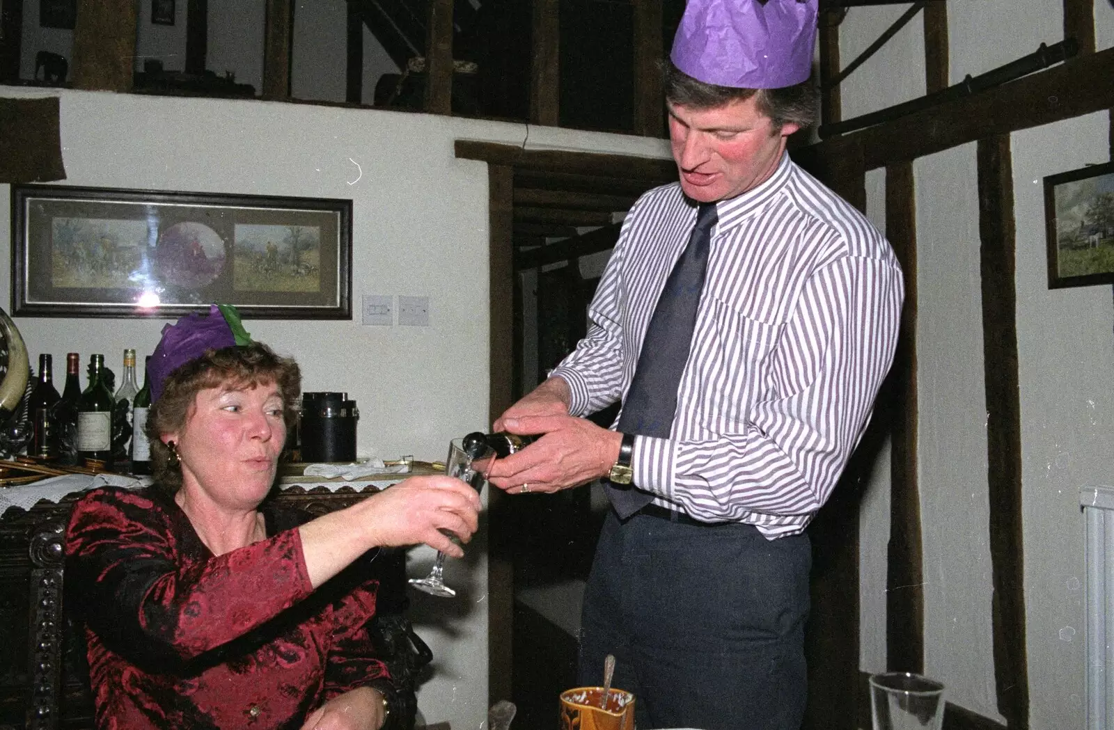 Geoff pours out some fizz, from Christmas Dinner with Geoff and Brenda, Stuston, Suffolk - 25th December 1990