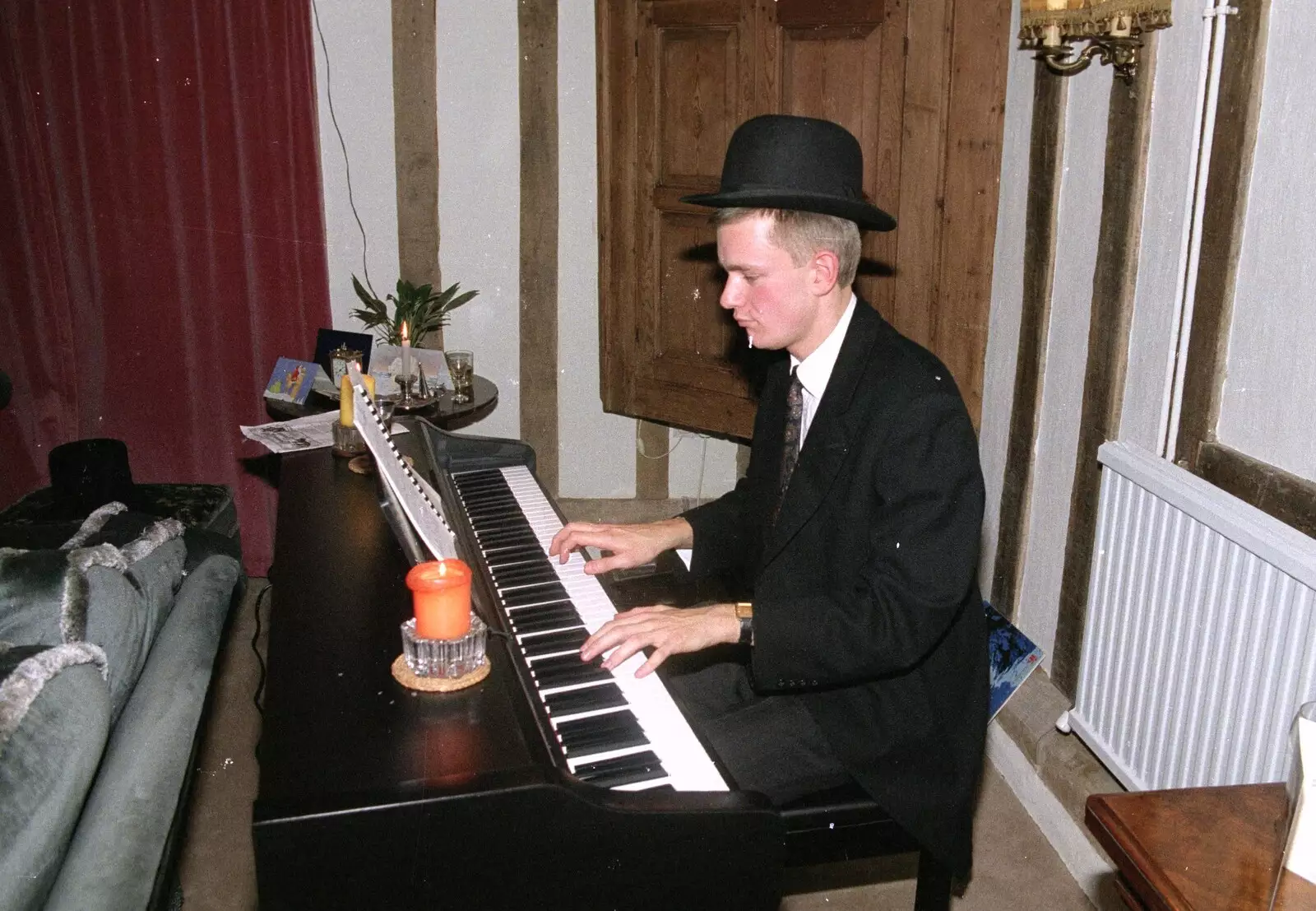 Nosher plays piano, from Christmas Dinner with Geoff and Brenda, Stuston, Suffolk - 25th December 1990