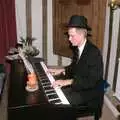 Nosher plays piano, Christmas Dinner with Geoff and Brenda, Stuston, Suffolk - 25th December 1990