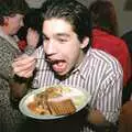 Nigel tucks in to some grub, New Year's Eve at Phil's, Hordle, Hampshire - 31st December 1990