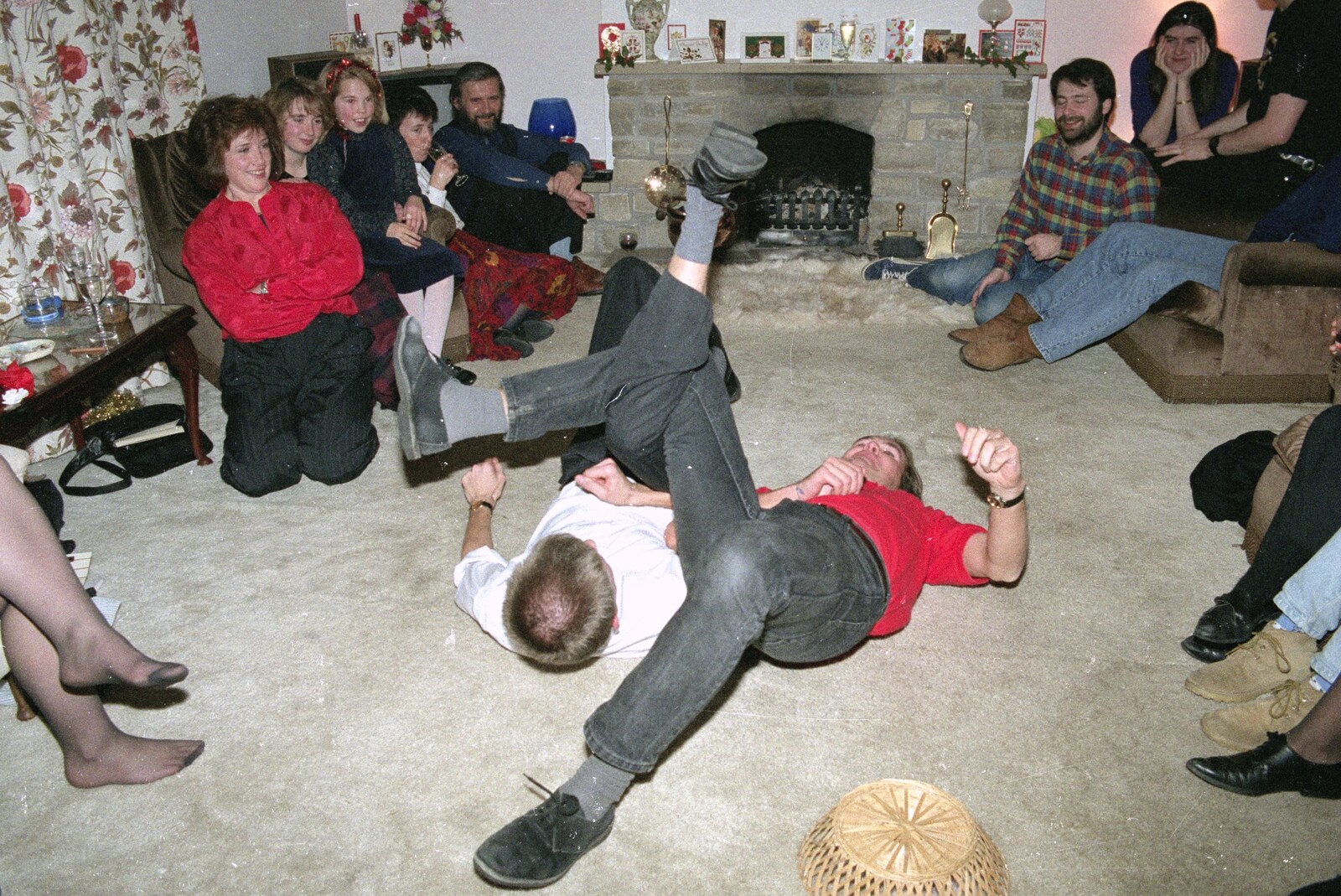 Nosher and Phil do a spot of leg wrestling from New Year's Eve at Phil's, Hordle, Hampshire - 31st December 1990