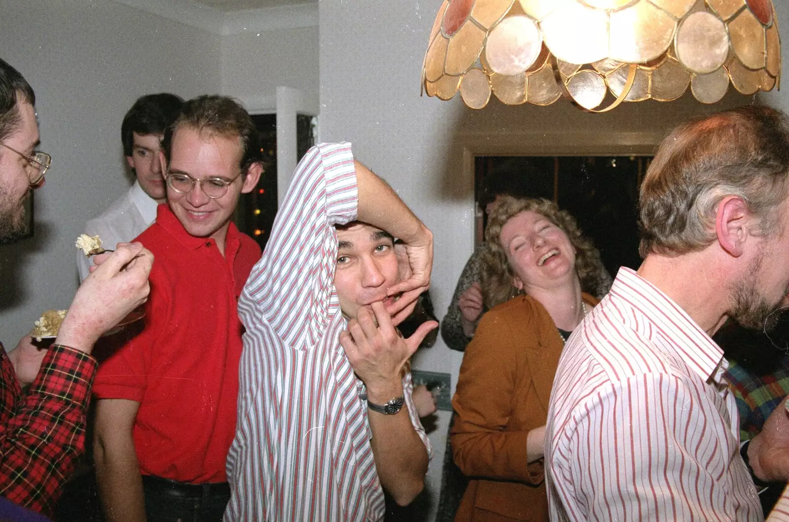 Nigel Mukherjee does a bit of gurning, from New Year's Eve at Phil's, Hordle, Hampshire - 31st December 1990