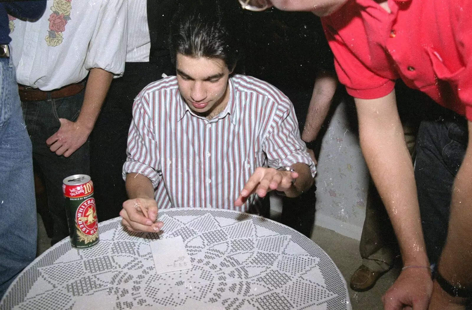 Nigel holds court in some sort of drawing game, from New Year's Eve at Phil's, Hordle, Hampshire - 31st December 1990