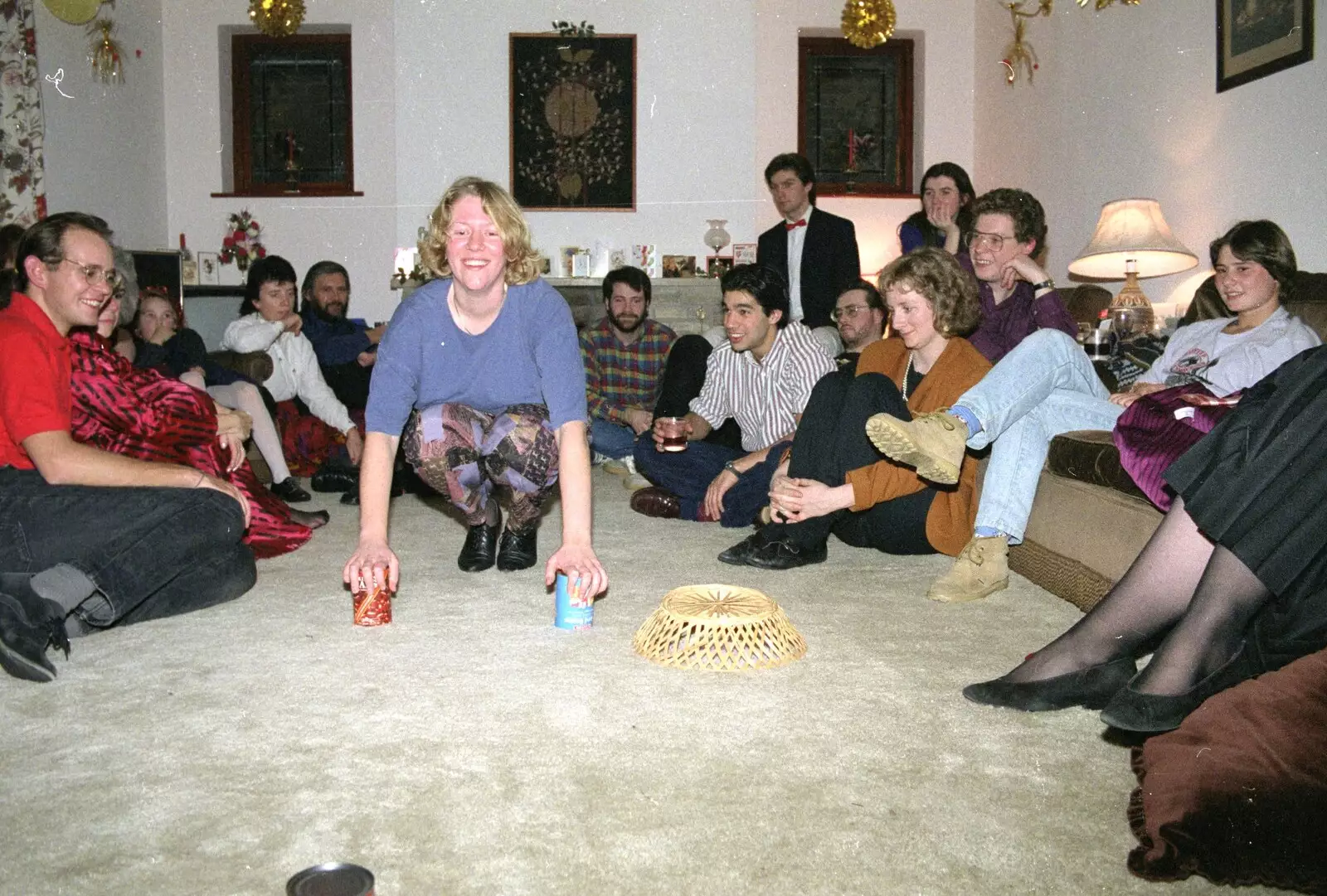 Liz tries the can-walking thing, from New Year's Eve at Phil's, Hordle, Hampshire - 31st December 1990