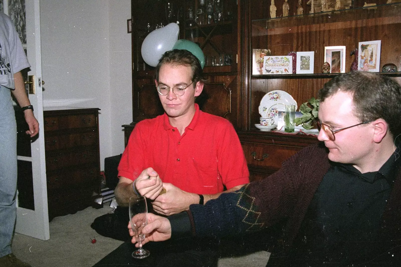 Phil opens a bottle of fizz, from New Year's Eve at Phil's, Hordle, Hampshire - 31st December 1990