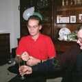 Phil opens a bottle of fizz, New Year's Eve at Phil's, Hordle, Hampshire - 31st December 1990