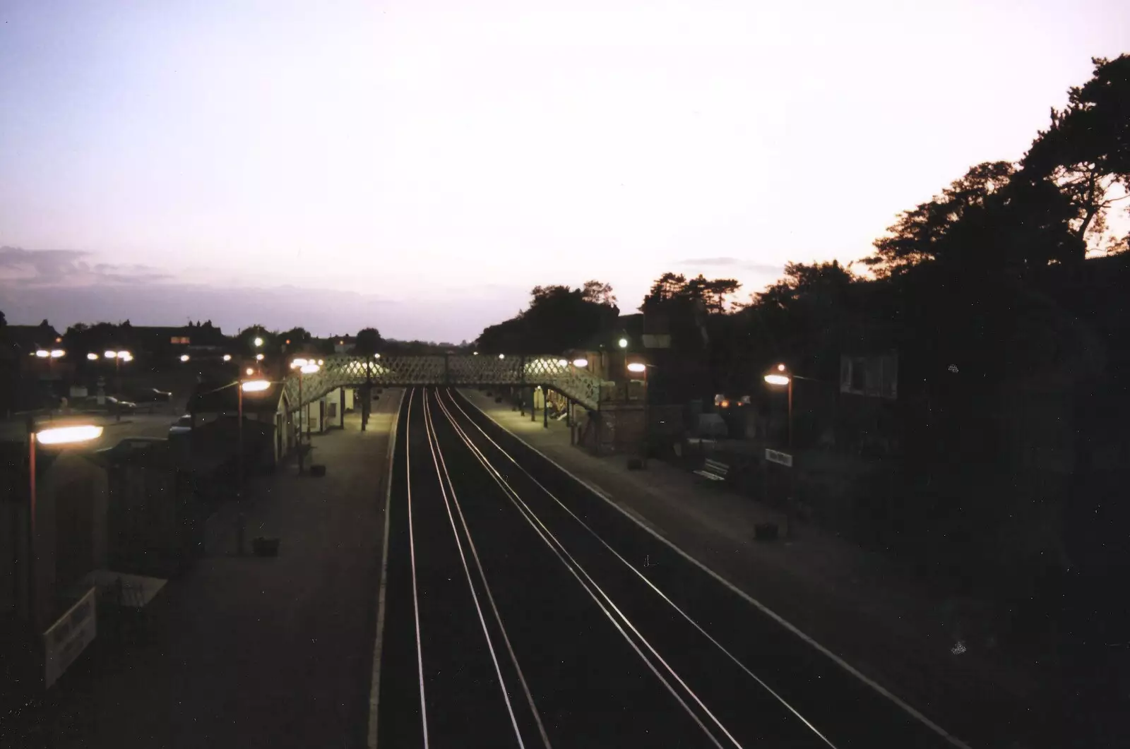 The rails to Bournemouth reflect the sun, from New Year's Eve at Phil's, Hordle, Hampshire - 31st December 1990