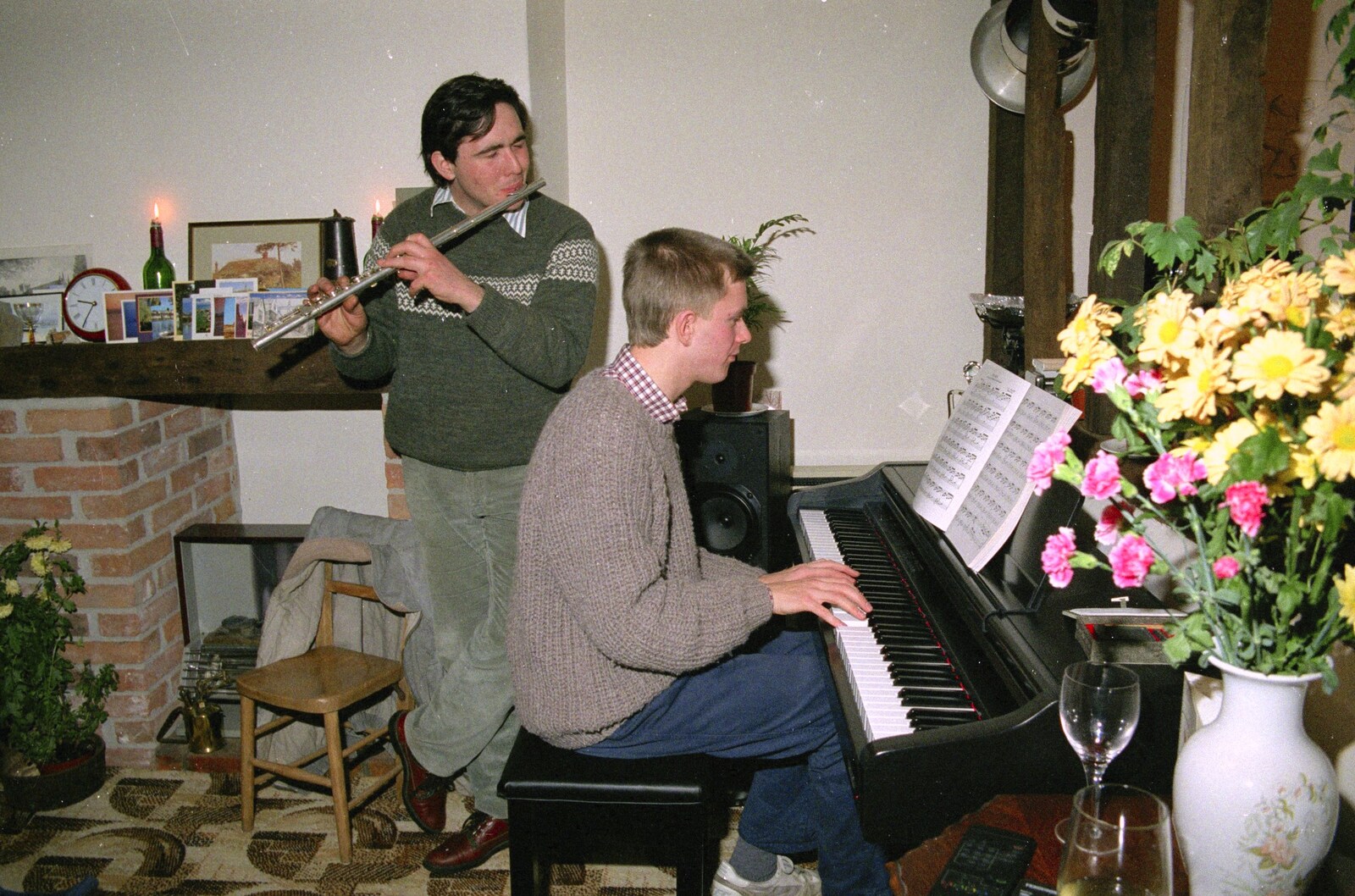 David plays flute to some piano accompaniment from Sledging on the Common and Some Music, Stuston, Suffolk - 5th February 1991