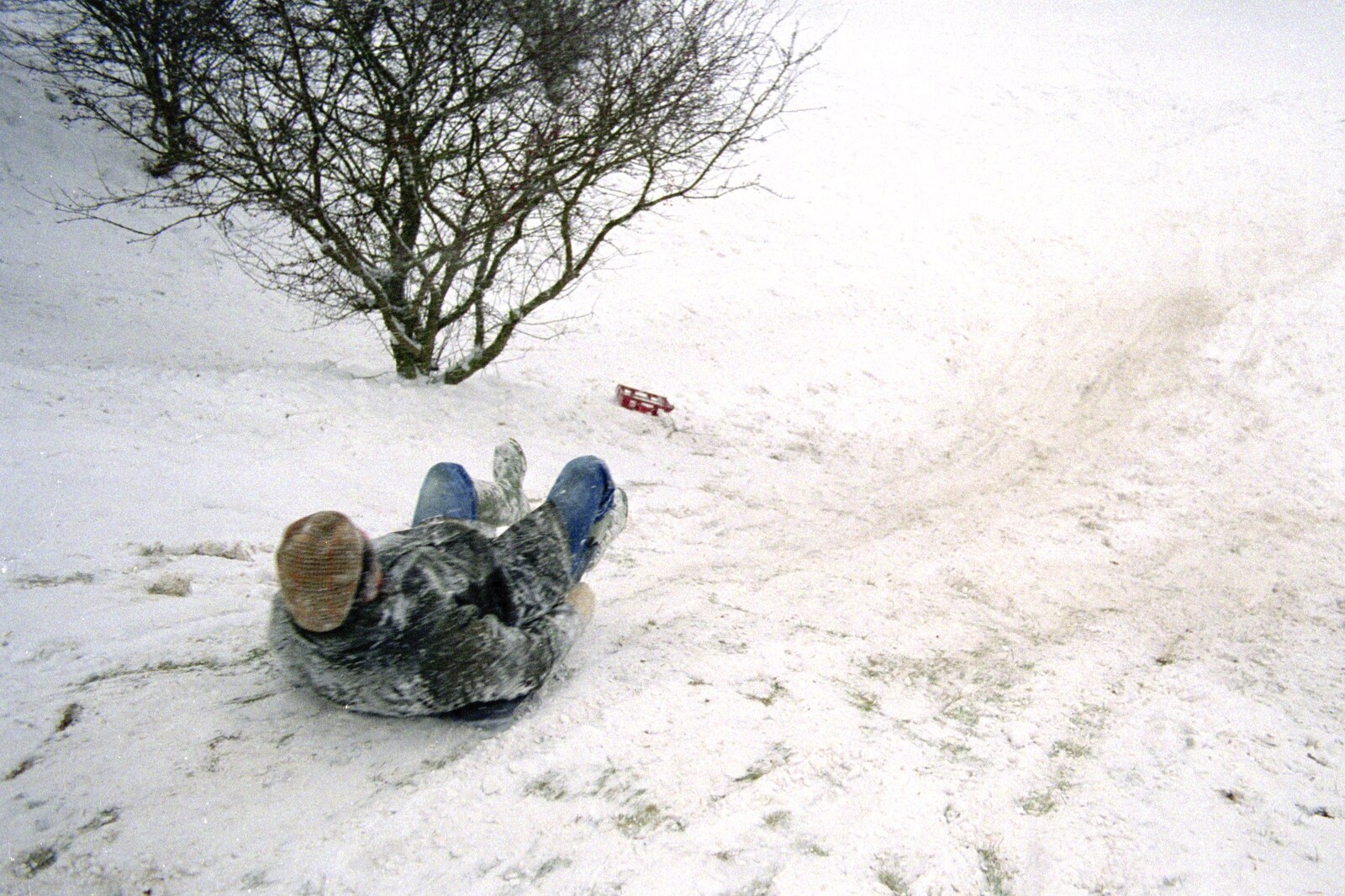 Geoff slides down the hill on Stuston common from Sledging on the Common and Some Music, Stuston, Suffolk - 5th February 1991