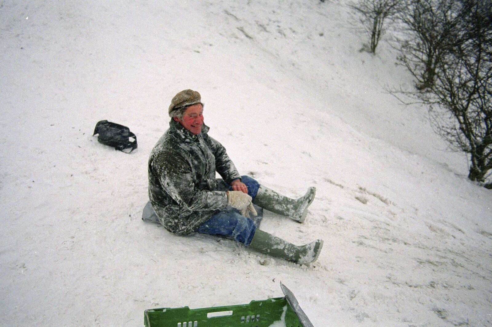 Geoff's on his arse on a fertiliser bag from Sledging on the Common and Some Music, Stuston, Suffolk - 5th February 1991