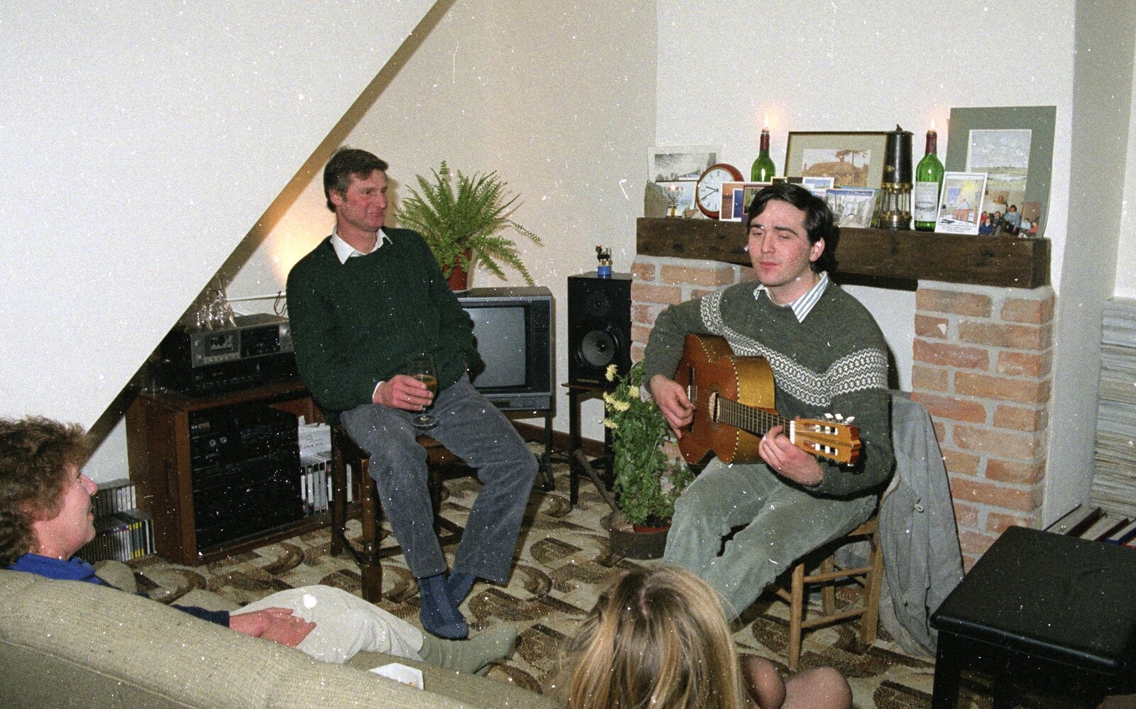 David entertains on guitar from Sledging on the Common and Some Music, Stuston, Suffolk - 5th February 1991