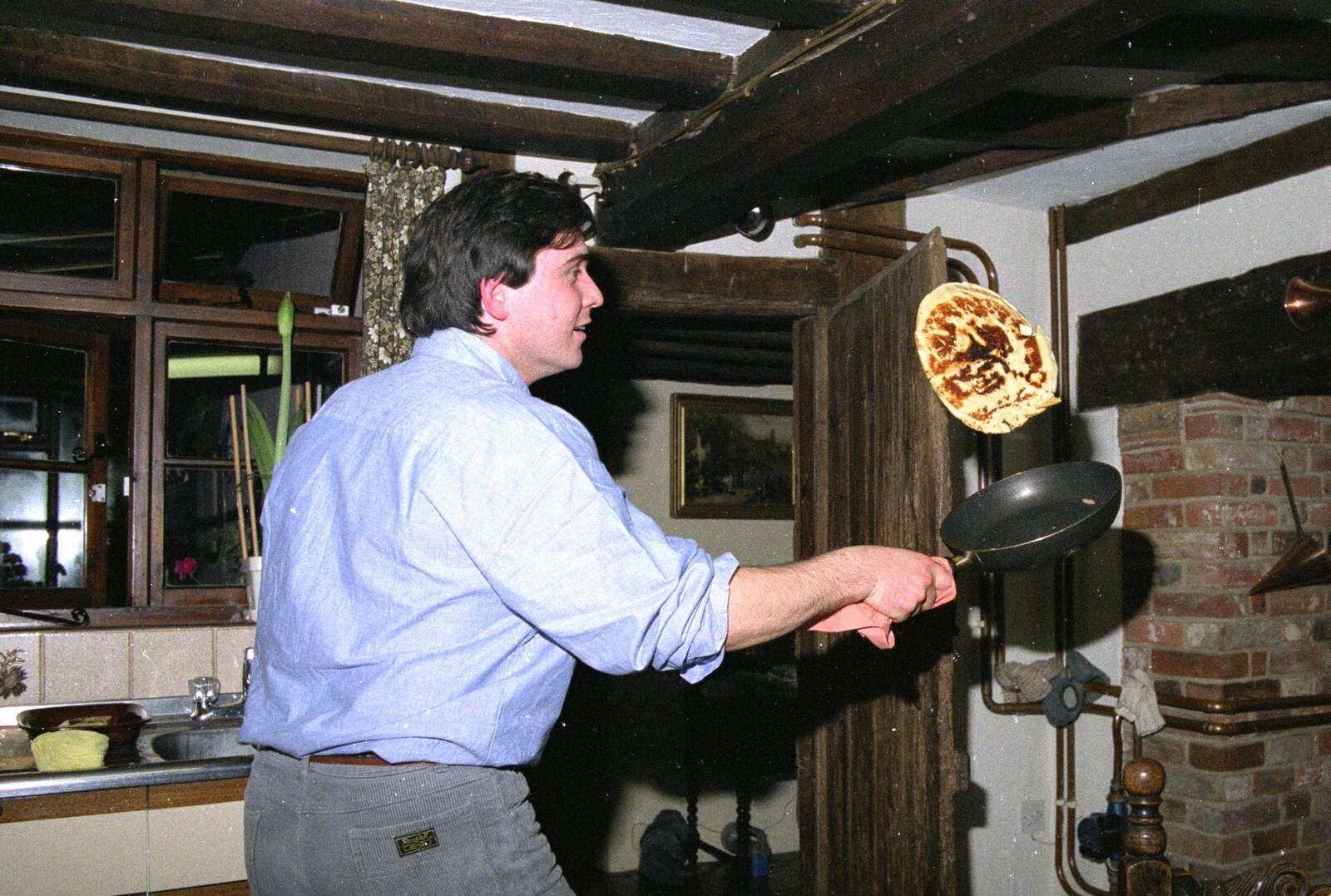 David gets his flip on from Pancake Day, Stuston, Suffolk - 18th February 1991