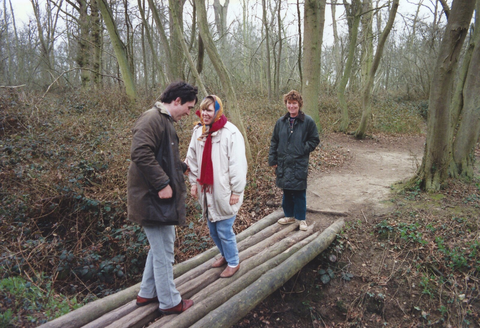 David, Janet and Brenda on a log bridge from A Walk in Tyrrel's Wood, Pulham St. Mary, Norfolk - 23rd February 1991