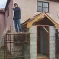 Bernie stands on scaffolding an points, Bernie and the Porch, The Stables, Stuston, Suffolk - 15th March 1991